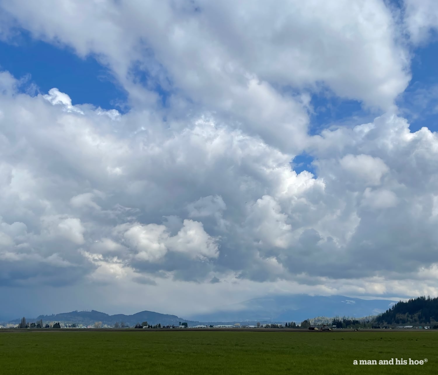 April clouds and snow in the mountains.