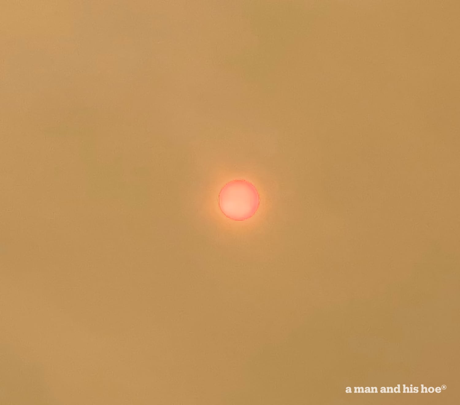 Sun through smokey clouds